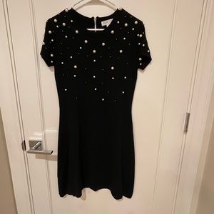 Black Dress with pearls. Above my knee my height is 5’3 and a half.